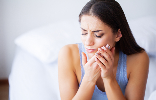 Gresham Advanced Dentistry – Emergency Tooth Pain Patient with severe tooth pain needing an emergency dentist in Gresham, OR