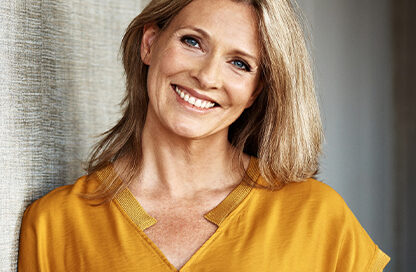 Smiling patient after a dental exam and cleaning at Gresham Advanced Dentistry