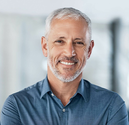 Gresham Advanced Dentistry – Dental Implants Dentures Patient smiling after dental implant treatment at Gresham Advanced Dentistry
