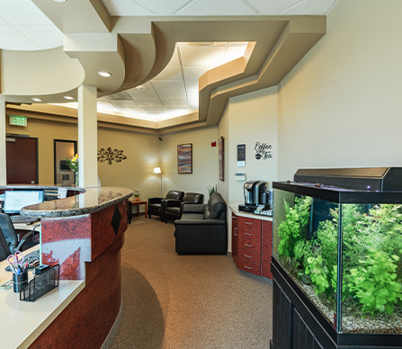 Gresham Advanced Dentistry – Office Waiting Area Patient waiting area with aquarium at Gresham Advanced Dentistry