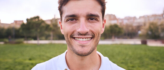 Confident smile after professional teeth whitening at Gresham Advanced Dentistry