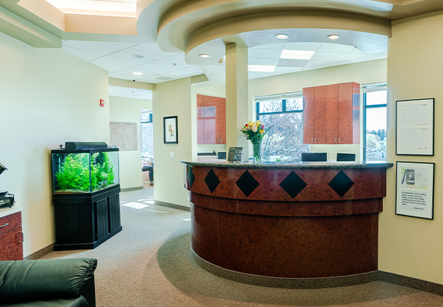 Gresham Advanced Dentistry – Office Reception with Aquarium Welcoming reception area at Gresham Advanced Dentistry in Gresham, Oregon