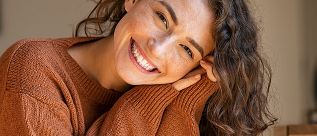 Smiling patient enjoying healthy teeth after general dentistry care at Gresham Advanced Dentistry in Gresham, OR