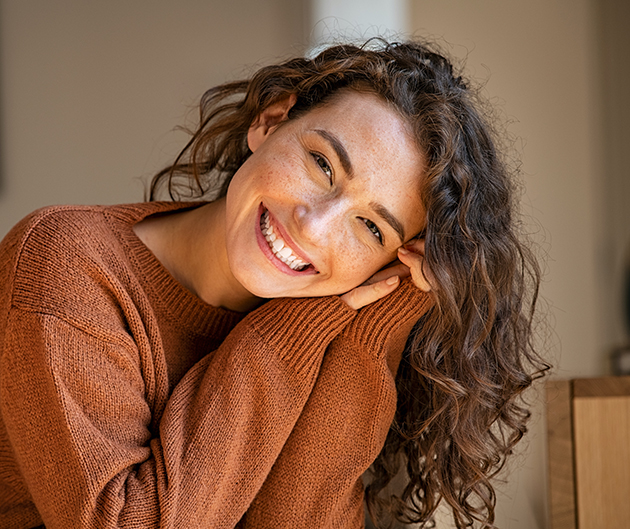 Smiling patient enjoying healthy teeth after general dentistry care at Gresham Advanced Dentistry in Gresham, OR