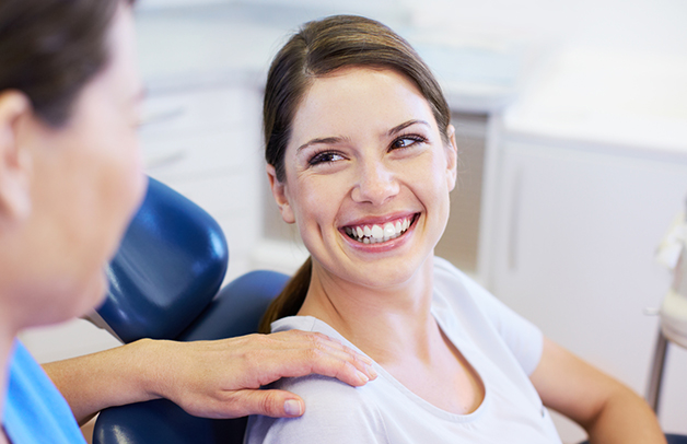 Gresham Advanced Dentistry – Dental Cleanings and Exams Patient Patient smiling during a dental cleaning and exam at Gresham Advanced Dentistry in Gresham, OR