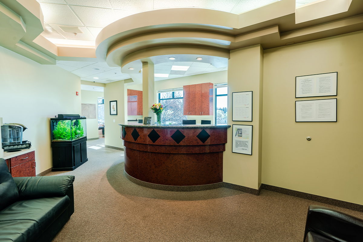 Gresham Advanced Dentistry – Office Tour 2 Reception desk and comfortable waiting area at Gresham Advanced Dentistry in Gresham, OR
